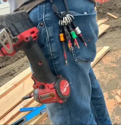 User operating the carabiner with one hand